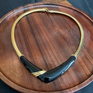 Gold tone and black enamel necklace